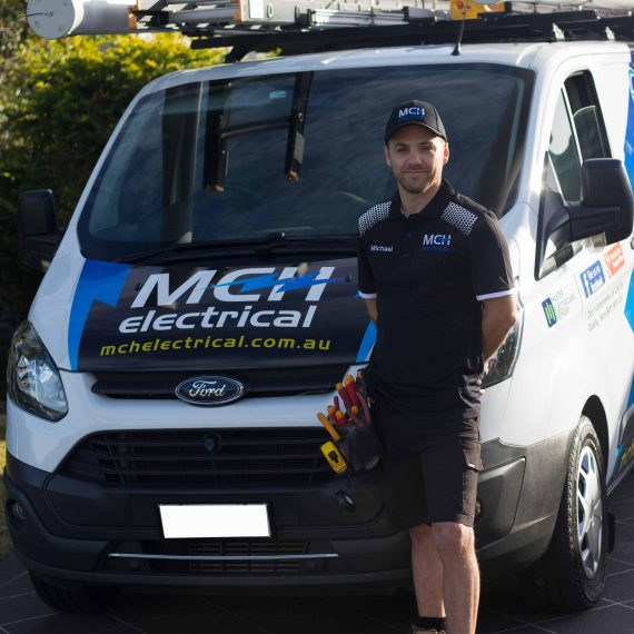 Michael Hill, owner of MCH Electrical, with the MCH Electrical van on the Gold Coast