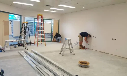MCH Electrical electricians performing regular electrical maintenance in a Gold Coast home