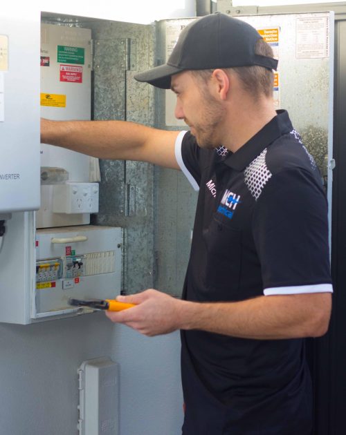 MCH Electrical electrician working on a home switchboard on the Gold Coast
